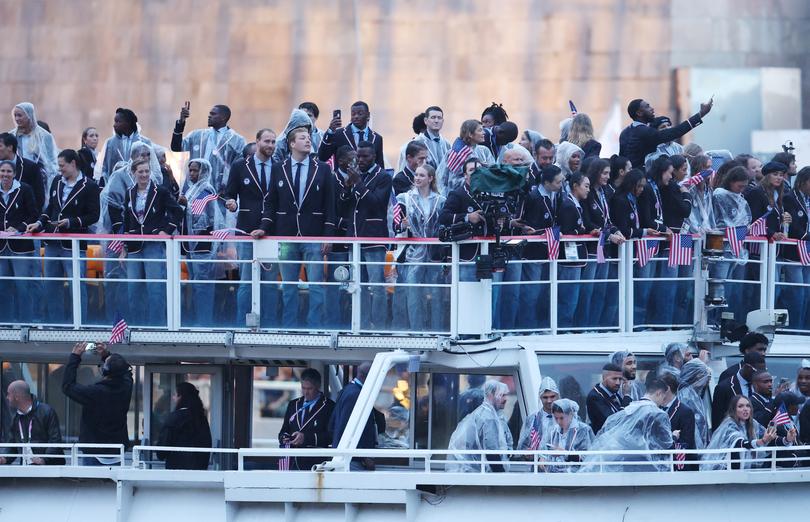 PARIS, FRANCE - JULY 26: Athletes of Team United States are seen on a boat along the River Seine during the opening ceremony of the Olympic Games Paris 2024 on July 26, 2024 in Paris, France. (Photo by Francois Nel/Getty Images)