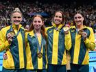 Emma McKeon with Shayna Jack, Mollie O’Callaghan and Meg Harris after winning the 4x100m freestyle medley.