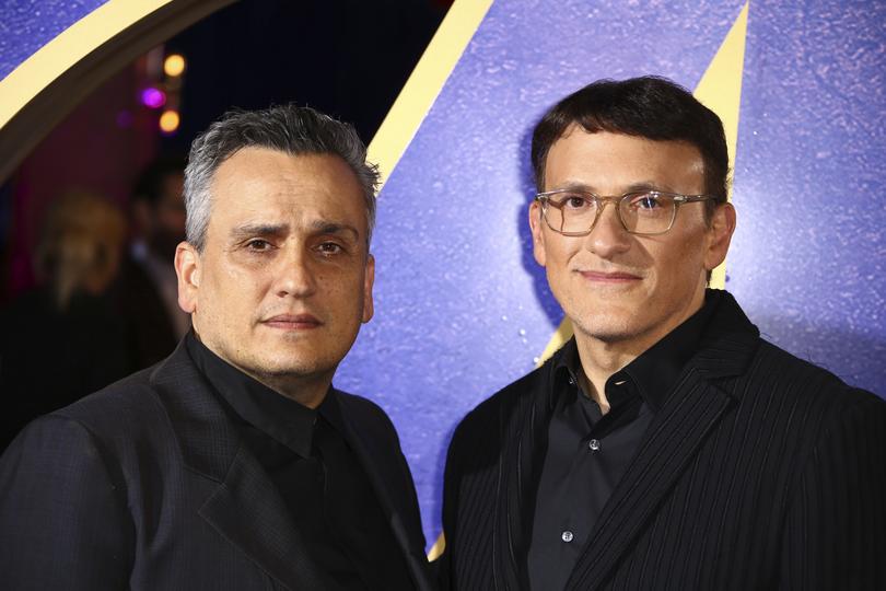 Directors Anthony Russo, right, and Joe Russo pose for photographers upon arrival at the 'Avengers Endgame' fan event in London, Wednesday, April 10, 2019. (Photo by Joel C Ryan/Invision/AP)