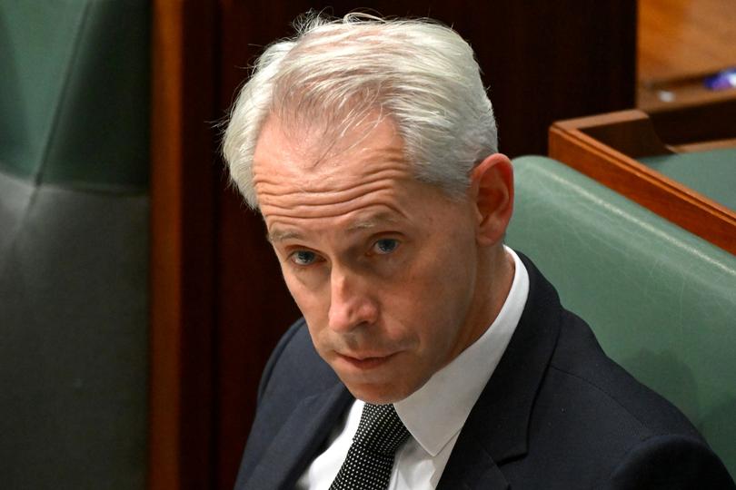 Australian Immigration Minister Andrew Giles reacts during Question Time at Parliament House in Canberra, Monday, June 3, 2024. (AAP Image/Lukas Coch) NO ARCHIVING