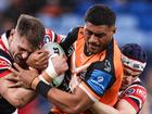 Giant prop Stefano Utoikamanu (c) has told Wests Tigers he's leaving after this NRL season. (Mark Evans/AAP PHOTOS)