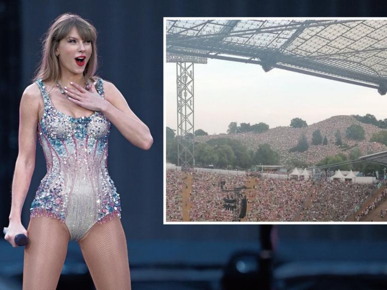 Taylor Swift fans have reached new heights to see the pop megastar's Eras Tour, sitting on a hill outside Munich's Olympiastadion.