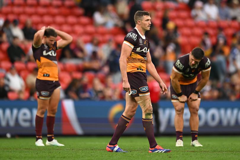 BRISBANE, AUSTRALIA - JULY 27: Corey Oates of the Broncos and team mates react after their defeat during the round 21 NRL match between Brisbane Broncos and Canterbury Bulldogs at Suncorp Stadium, on July 27, 2024, in Brisbane, Australia. (Photo by Albert Perez/Getty Images)