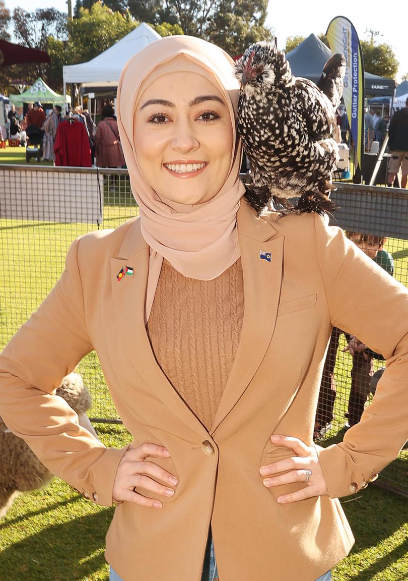 News. Senator Fatima Payman at the  North Perth Farmers Market. Senator Payman with chicken Malificient on her shoulder. 

 

Essentially meet and greet with supporters and other voters.