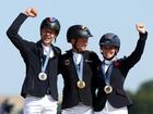 Gold medalist Michael Jung of Team Germany (C), silver medalist Christopher Burton of Team Australia (L) and bronze medalist Laura Collett of Team Great Britain.