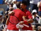 Rafael Nadal congratulates Novak Djokovic after the Serb won their eagerly-awaited Olympic clash. 