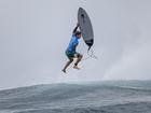 Jack Robinson battled through rough surf to win his round-of-16 clash.