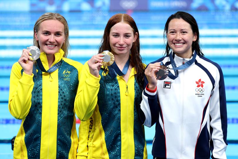 NANTERRE, FRANCE - JULY 29: Gold Medalist Mollie O'Callaghan of Team Australia (C), Silver Medalist Ariarne Titmus of Team Australia (L) and Siobhan Bernadette Haughey of Team Hong Kong (R) pose following the Swimming medal ceremony after the Women’s 200m Freestyle Final on day three of the Olympic Games Paris 2024 at Paris La Defense Arena on July 29, 2024 in Nanterre, France. (Photo by Quinn Rooney/Getty Images)