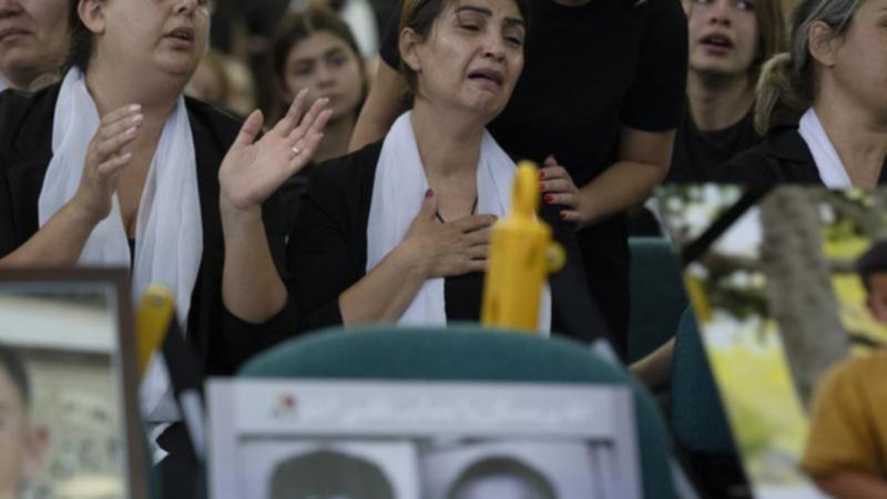 Members of the Druze minority attend a memorial ceremony