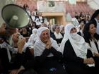 Members of the Druze minority attend a memorial ceremony for the children and teens, killed in a rocket strike in Majdal Shams.