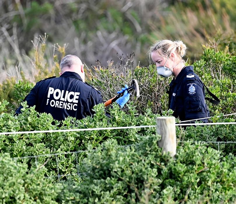 Police find a hammer near a pathway to Floreat Beach.