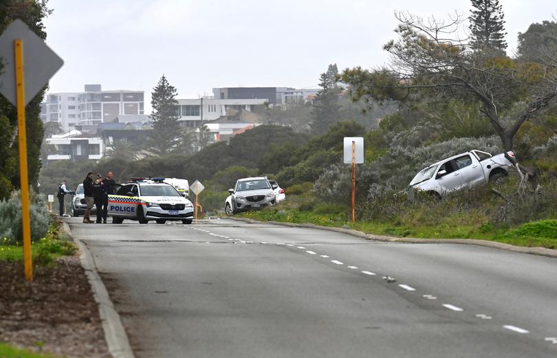 The man was allegedly run down by a silver BT-250 ute before being attacked by a hammer.