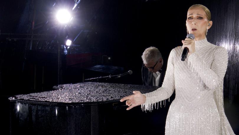 PARIS, FRANCE - JULY 26: (EDITOR'S NOTE: This Handout screengrab was provided by a third-party organization and may not adhere to Getty Images' editorial policy.) This handout released by the Olympic Broadcasting Services, shows a view of singer Celine Dion performing on the Eiffel Tower during the opening ceremony of the Paris 2024 Olympic Games Paris 2024 on July 26, 2024 in Paris, France. (Screengrab by IOC via Getty Images)