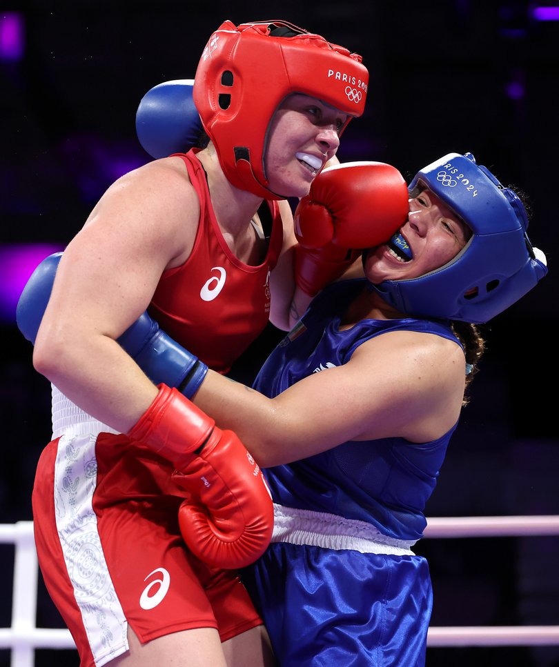 PARIS, FRANCE - JULY 31: Caitlin Parker of Team Australia and Citlalli Vanessa Ortiz of Team Mexico exchange punches during the Women's 75kg preliminary round match between Caitlin Parker of Team Australia and Citlalli Vanessa Ortiz of Team Mexico on day five of the Olympic Games Paris 2024 at North Paris Arena on July 31, 2024 in Paris, France. (Photo by Richard Pelham/Getty Images)