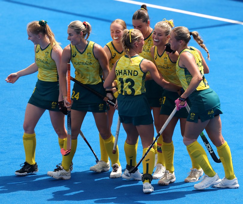 PARIS, FRANCE - JULY 31: Alice Arnott of Team Australia (2R) celebrates scoring her team's second goal with teammates during the Women's Pool A match between France and Germany on day five of the Olympic Games Paris 2024 at Stade Yves Du Manoir on July 31, 2024 in Paris, France. (Photo by Michael Reaves/Getty Images)