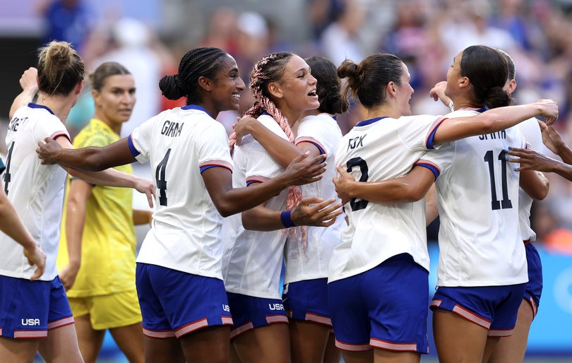 MARSEILLE, FRANCE - JULY 31: Trinity Rodman #5 of Team United States celebrates with teammates after scoring her team's first goal during the Women's group B match between Australia and United States during the Olympic Games Paris 2024 at Stade de Marseille on July 31, 2024 in Marseille, France. (Photo by Alex Livesey/Getty Images)