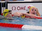 Australian swimmers Shayna Jack (left) and Mollie O'Callaghan (right) react after the 100m freestyle final.