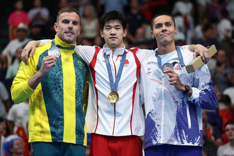 Kyle Chalmers and Pan Zhanle posed together on the podium.