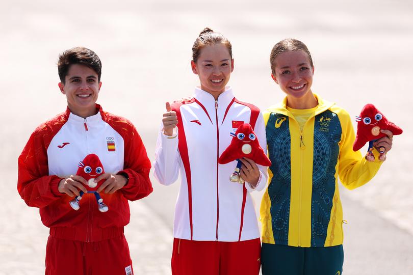 PARIS, FRANCE - AUGUST 01: Gold medalist Jiayu Yang of Team People's Republic of China (C), Silver medalist Maria Perez of Team Spain (L) and Bronze medalist Jemima Montag of Team Australia (R) pose on the podium after the Women's 20km Race Walk on day six of the Olympic Games Paris 2024 at Trocadero on August 01, 2024 in Paris, France. (Photo by Christian Petersen/Getty Images)