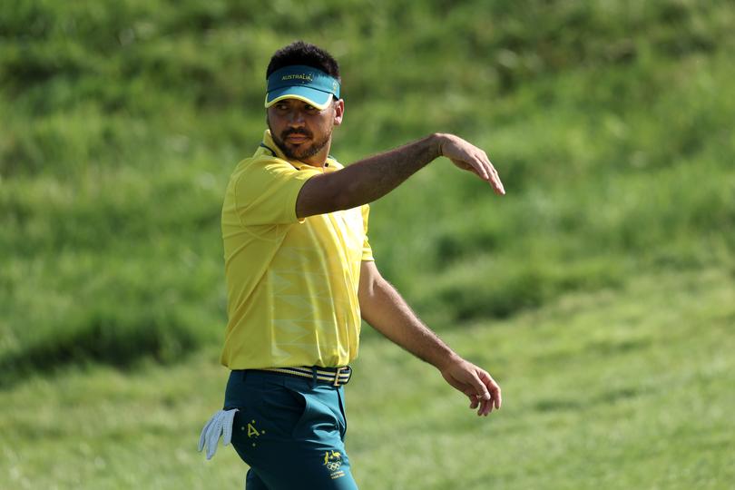 PARIS, FRANCE - AUGUST 01: Jason Day of Team Australia gestures as he walks across on the third hole during Day One of the Men's Individual Stroke Play on day six of the Olympic Games Paris 2024 at Le Golf National on August 01, 2024 in Paris, France. (Photo by Kevin C. Cox/Getty Images)