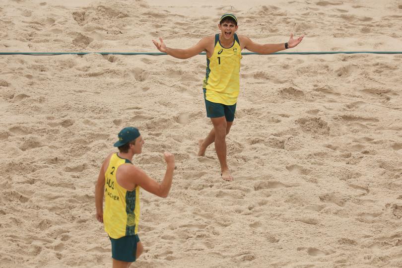 Izac Carracher and Mark Nicolaidis of Team Australia celebrate.