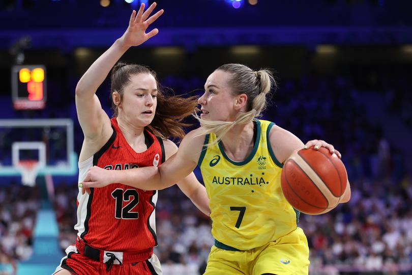 LILLE, FRANCE - AUGUST 01: Tess Madgen #7 of Team Australia competes during the Women's Group Phase - Group B match between Team Australia and Team Canada on day six of the Olympic Games Paris 2024 at Stade Pierre Mauroy on August 01, 2024 in Lille, France. (Photo by Gregory Shamus/Getty Images)