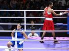 Angela Carini (L) and Imane Khelif after their Games boxing bout ended abruptly in the first round. (Joel Carrett/AAP PHOTOS)