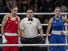 Algeria's Imane Khelif (in red) and Italy's Angela Carini during their women's 66kg preliminaries round of 16 boxing match during in Paris.