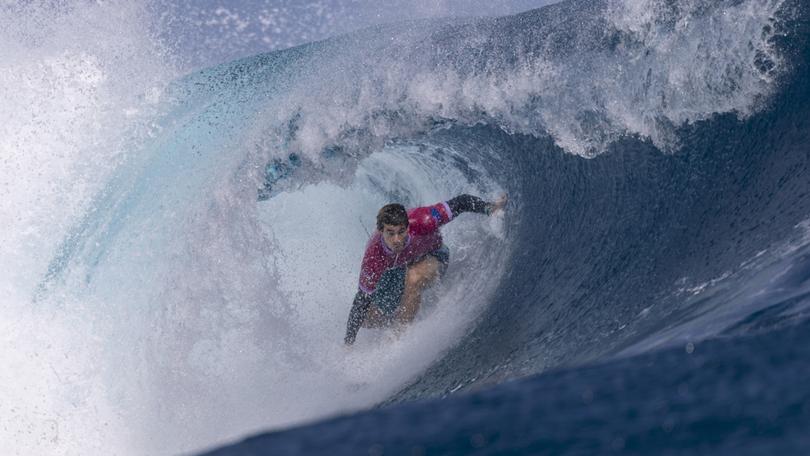 West Australian surfer Jack Robinson has charged into the Olympics semifinal with an impressive barrel-riding performance to boot countryman Ethan Ewing from the tournament. 