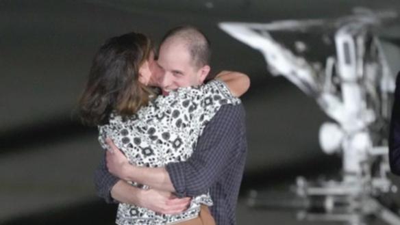 Evan Gershkovich hugged his mother, Ella Milman, as President Joe Biden welcomed him home. 