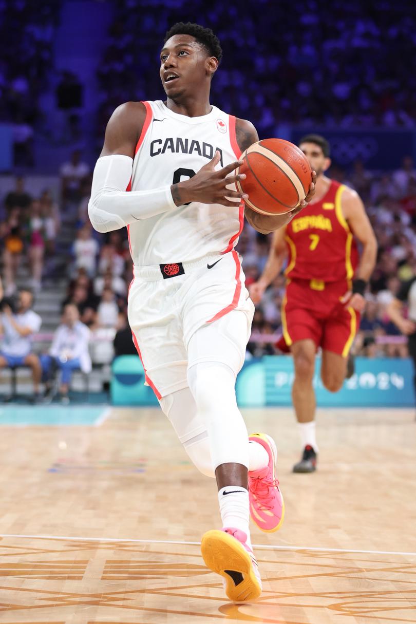 LILLE, FRANCE - AUGUST 02: Rj Barrett #9 of Team Canada dribbles during the Men's Group Phase - Group A game between Team Canada and Team Spain on day seven of the Olympic Games Paris 2024 at Stade Pierre Mauroy on August 02, 2024 in Lille, France. (Photo by Gregory Shamus/Getty Images)