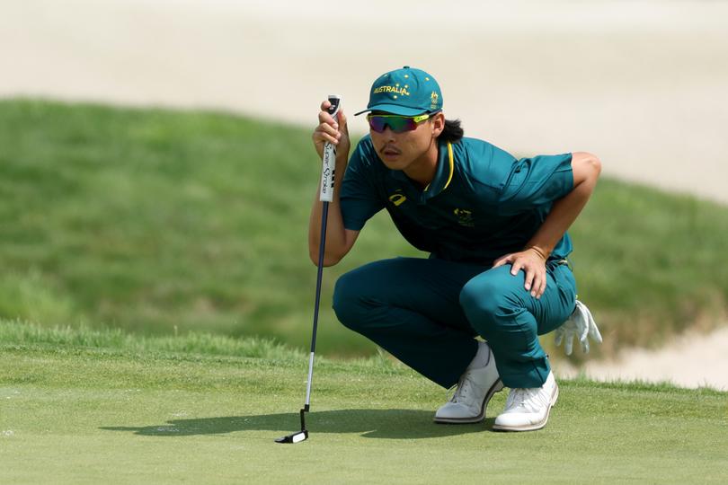 PARIS, FRANCE - AUGUST 02: Min Woo Lee of Team Australia lines up a putt on the 14th green during Day Two of the Men's Individual Stroke Play on day seven of the Olympic Games Paris 2024 at Le Golf National on August 02, 2024 in Paris, France. (Photo by Kevin C. Cox/Getty Images)