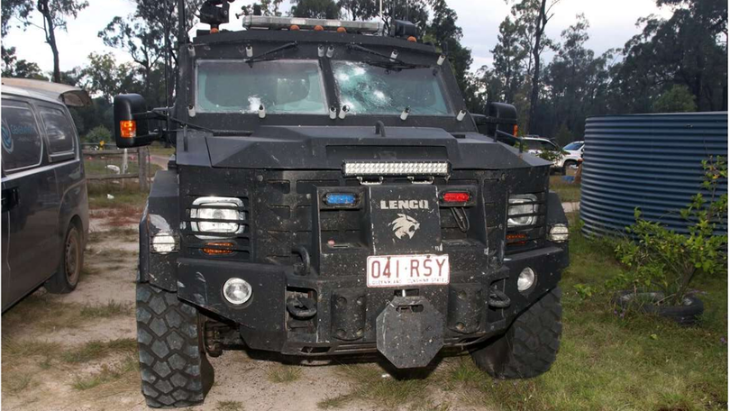 A vehicle with bullet holes sustained during the ambush.