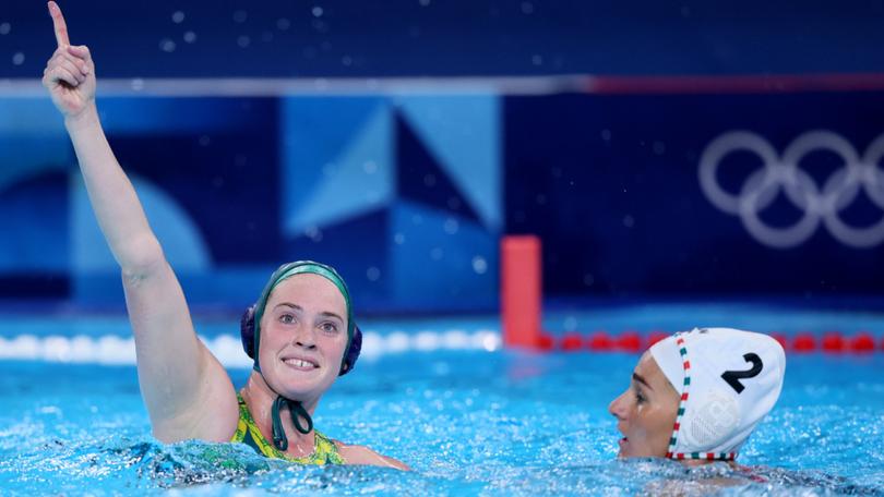Alice Williams scored four goals as Australia beat Hungary to top their pool in women’s water polo.