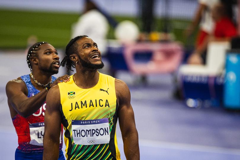 Lyles and Thompson waiting for the result to be announced.