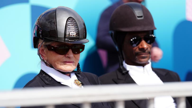 Snoop Dogg and Martha Stewart watching the Dressage Team Grand Prix Special at the Chateau de Versailles at the Paris Olympics.