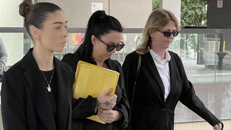 Triple-zero operator Emma Donald (centre) feared being accused of "snooping" over a police incident. (Rex Martinich/AAP PHOTOS)