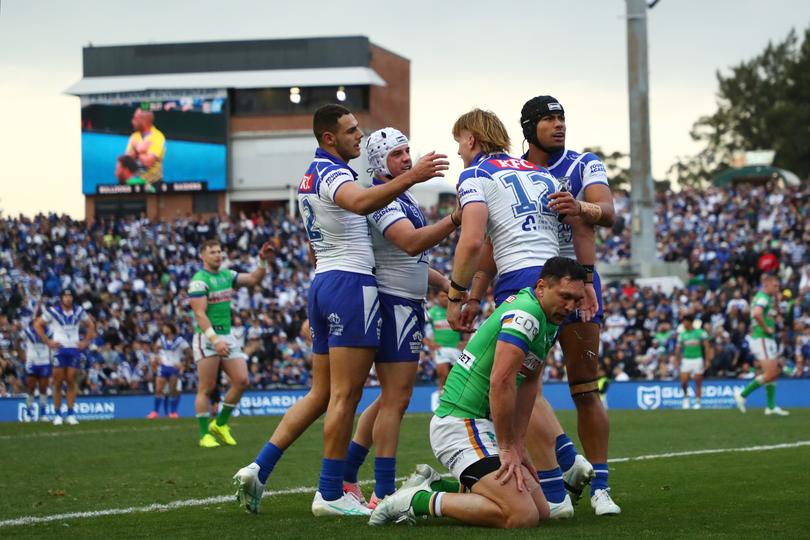 SYDNEY, AUSTRALIA - AUGUST 04: Bulldogs celebrate a try which was later denied during the round 22 NRL match between Canterbury Bulldogs and Canberra Raiders at Belmore Sports Ground, on August 04, 2024, in Sydney, Australia. (Photo by Jeremy Ng/Getty Images)