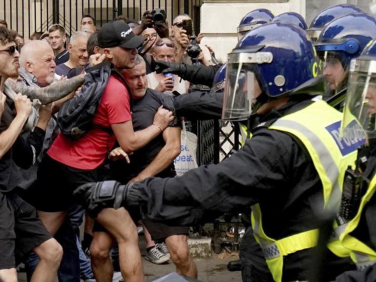 UK police are braced for more violent protests after three girls were killed in a knife attack. (AP PHOTO)