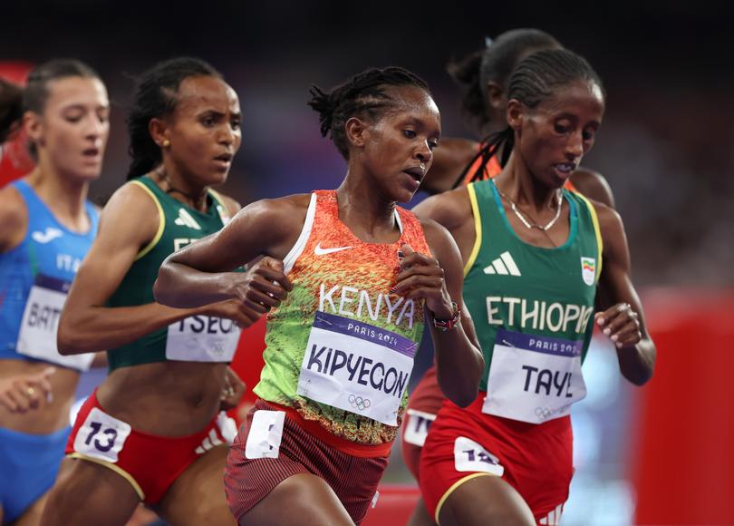 PARIS, FRANCE - AUGUST 05: Faith Kipyegon of Team Kenya competes during the Women's 5000m Final on day ten of the Olympic Games Paris 2024 at Stade de France on August 05, 2024 in Paris, France. (Photo by Christian Petersen/Getty Images)