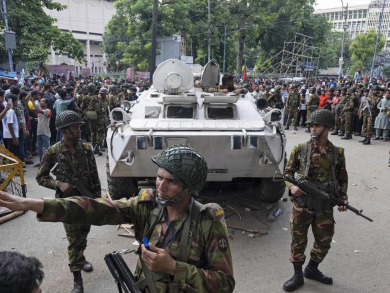 Bangladesh's army chief urged an end to violence and said an interim government would be formed. (AP PHOTO)