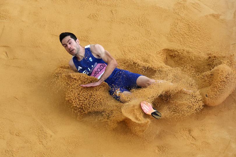 PARIS, FRANCE - AUGUST 06: (EDITORS NOTE: Image was captured using a robotic camera positioned above the field of play.) Miltiadis Tentoglou of Team Greece competes in the Men's Long Jump Final on day eleven of the Olympic Games Paris 2024 at Stade de France on August 06, 2024 in Paris, France. (Photo by Richard Heathcote/Getty Images)