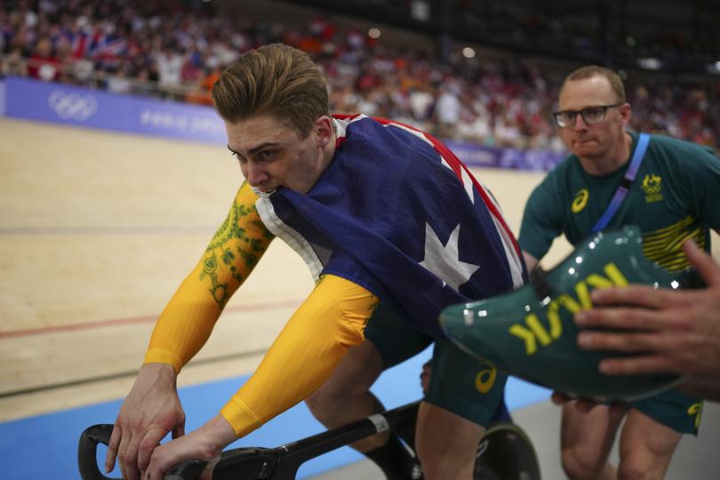 Matthew Glaetzer with the Aussie flag.