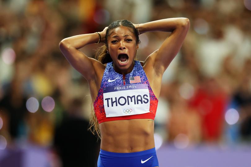 PARIS, FRANCE - AUGUST 06: Gabrielle Thomas of Team United States celebrates winning the gold medal after competing in the Women's 200m Final during the Athletics on day eleven of the Olympic Games Paris 2024 at Stade de France on August 06, 2024 in Paris, France. (Photo by Pascal Le Segretain/Getty Images)