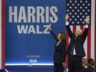 Democratic presidential nominee Vice President Kamala Harris and her running mate Minnesota Gov. Tim Walz arrive for a campaign rally in Philadelphia, Tuesday, Aug. 6, 2024. (AP Photo/Joe Lamberti)