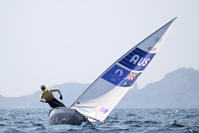 MARSEILLE, FRANCE - AUGUST 07: Matt Wearn of Team Australia competes in the Men's Dinghy ILCA medal race on day twelve of the Olympic Games Paris 2024 at Marseille Marina on August 07, 2024 in Marseille, France. (Photo by Clive Mason/Getty Images)