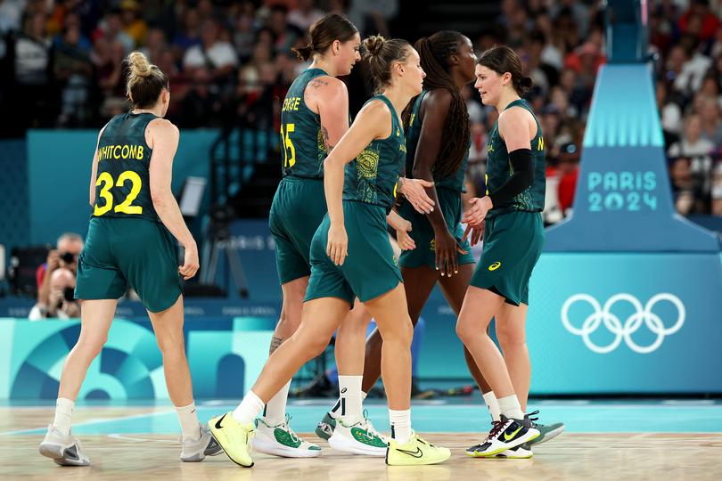 PARIS, FRANCE - AUGUST 07: Team Australia celebrate during the Women's Quarterfinal match between Team Serbia and Team Australia on day twelve of the Olympic Games Paris 2024 at Bercy Arena on August 07, 2024 in Paris, France. (Photo by Gregory Shamus/Getty Images)