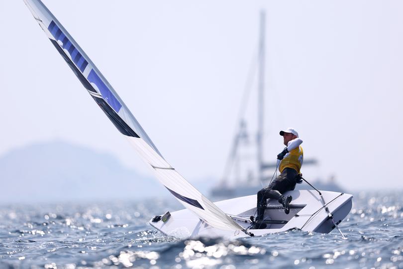 MARSEILLE, FRANCE - AUGUST 07: Matt Wearn of Team Australia competes in the Men's Dinghy ILCA medal race on day twelve of the Olympic Games Paris 2024 at Marseille Marina on August 07, 2024 in Marseille, France. (Photo by Phil Walter/Getty Images)