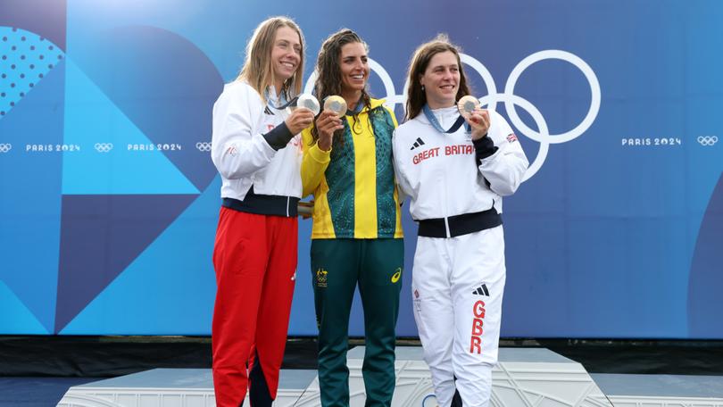 Gold medalist Jessica Fox of Team Australia (C), silver medalist Klaudia Zwolinska of Team Poland (L), and bronze medalist Kimberley Woods of Team Great Britain. Zwolinska is set to receive cash and other gifts in line with the rewards dished out to Polish athletes.