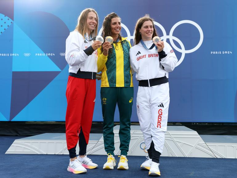 Gold medalist Jessica Fox of Team Australia (C), silver medalist Klaudia Zwolinska of Team Poland (L), and bronze medalist Kimberley Woods of Team Great Britain. Zwolinska is set to receive cash and other gifts in line with the rewards dished out to Polish athletes.